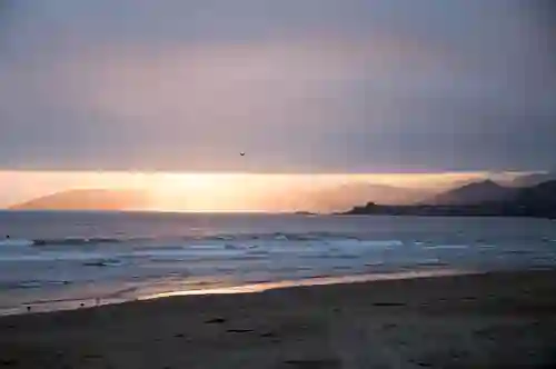 Looking north along the Sonoma County coast at sunset from Pismo Beach, CA. Note: image is hyper-compressed with javascript disabled.