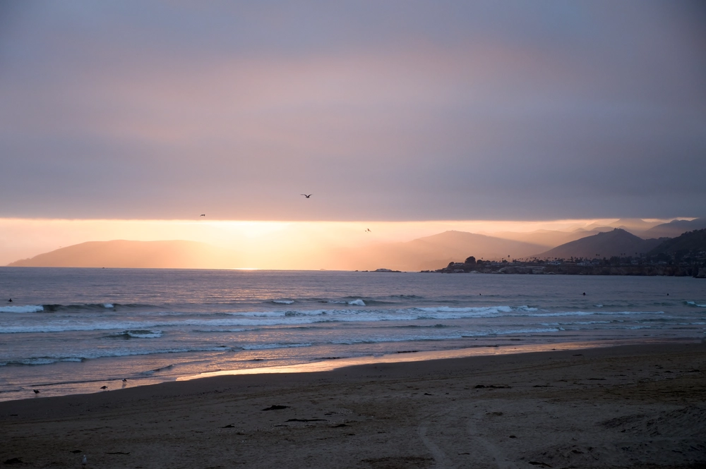 Looking north along the Sonoma County coast at sunset from Pismo Beach, CA.