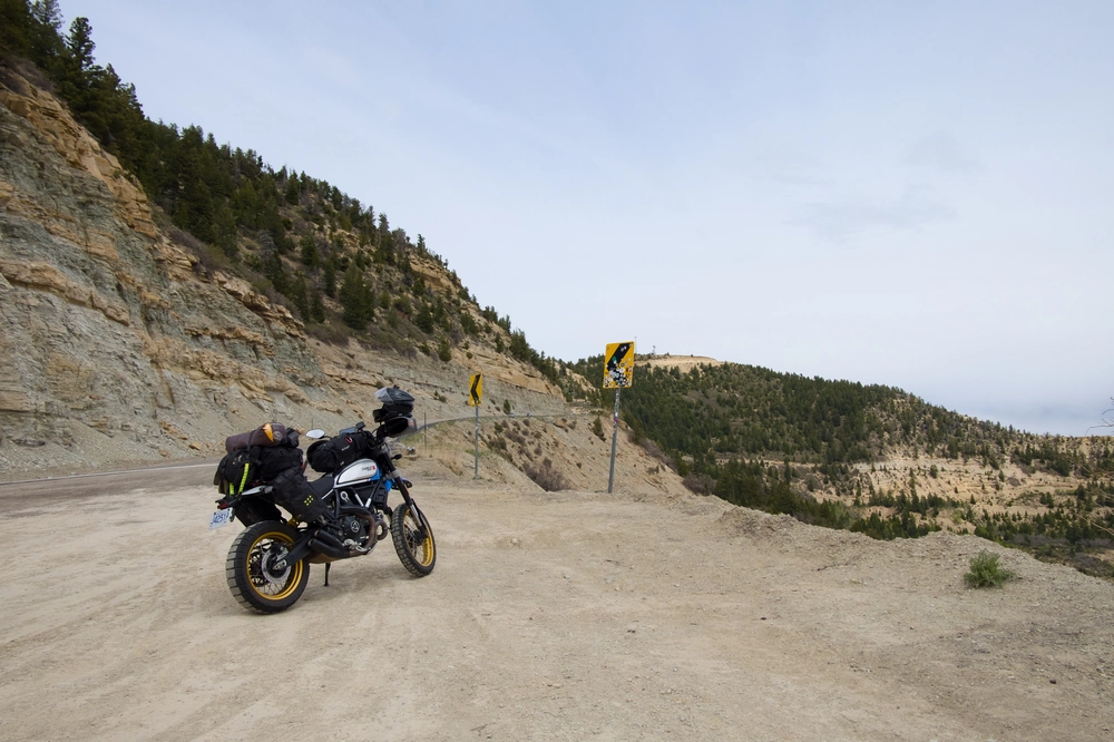 Lucia parked aside a highway.