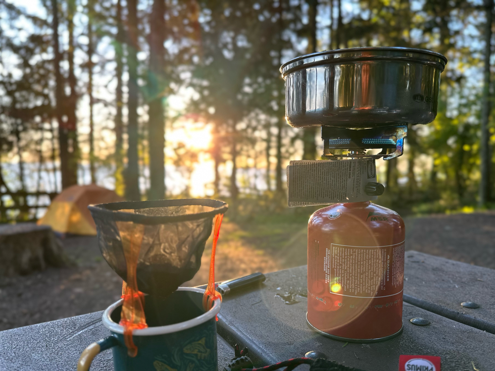 Waking up with coffee on a Primus camp stove.